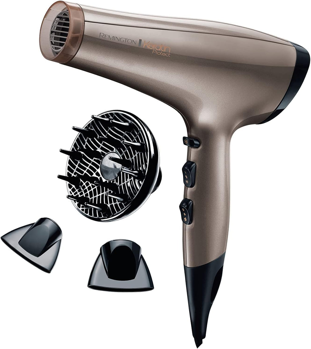 Remington Sèche-cheveux Professionnel [Soin Kératine & Huile d'Amande] Keratin Therapy (2200W, Moteur AC puissant & durable 130km/h, Ionique Céramique, 3 températures/2 vitesses, 3 accessoires) AC8002